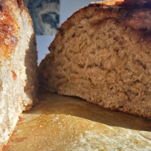 Freshly baked cinnamon and sugar sourdough bread with a golden crust, made using natural fermentation and simple ingredients